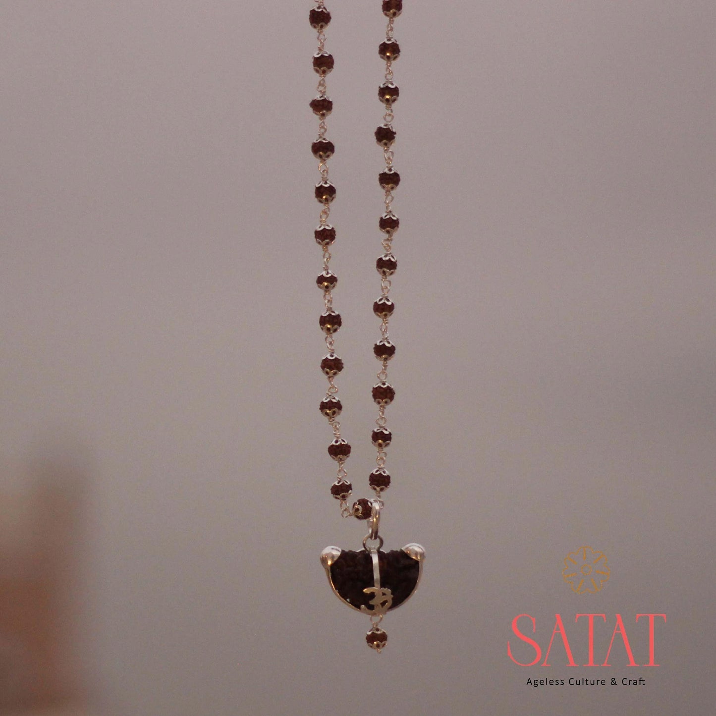 Rudraksha Mala with  Ek Mukhi Pure silver Locket