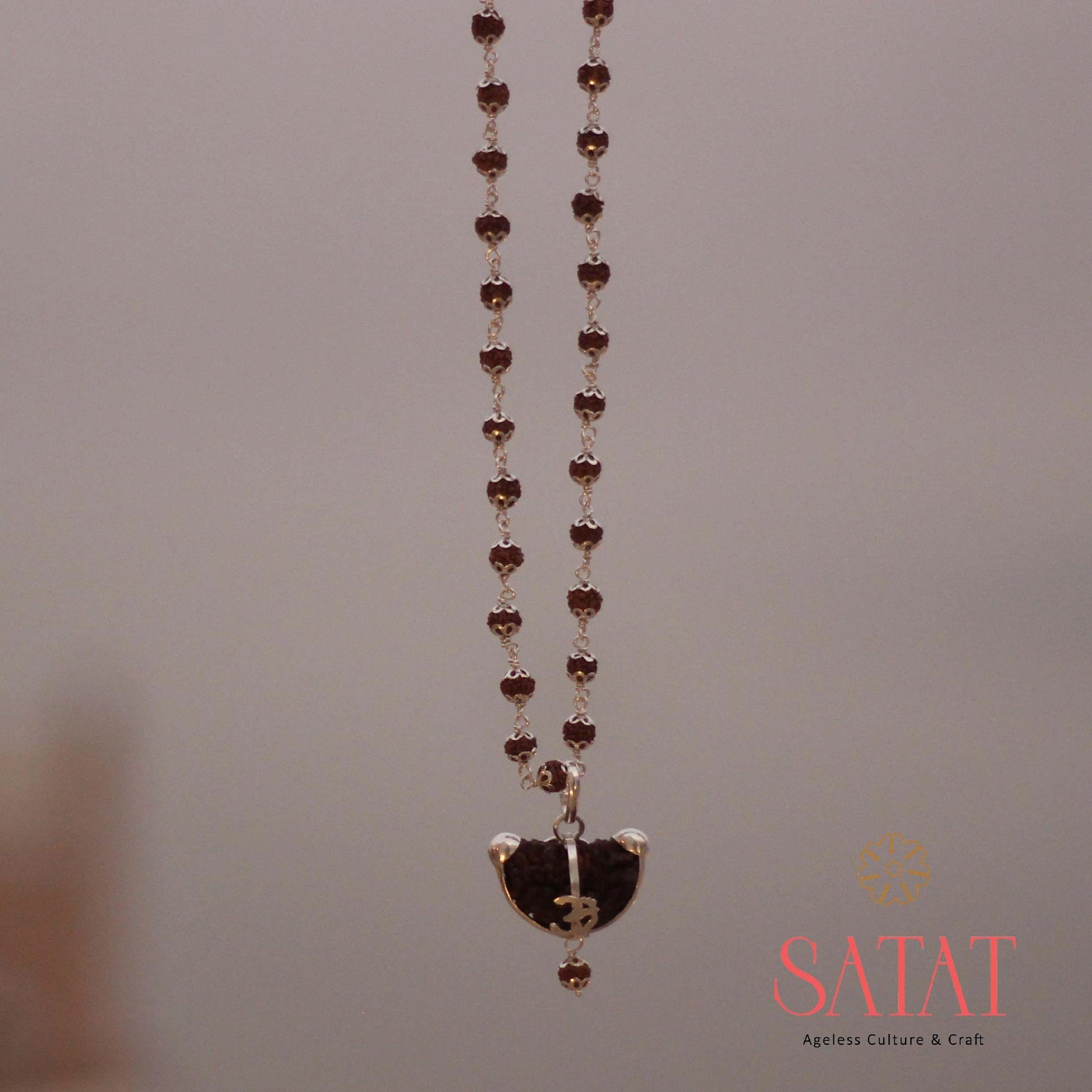 Rudraksha Mala with  Ek Mukhi Pure silver Locket