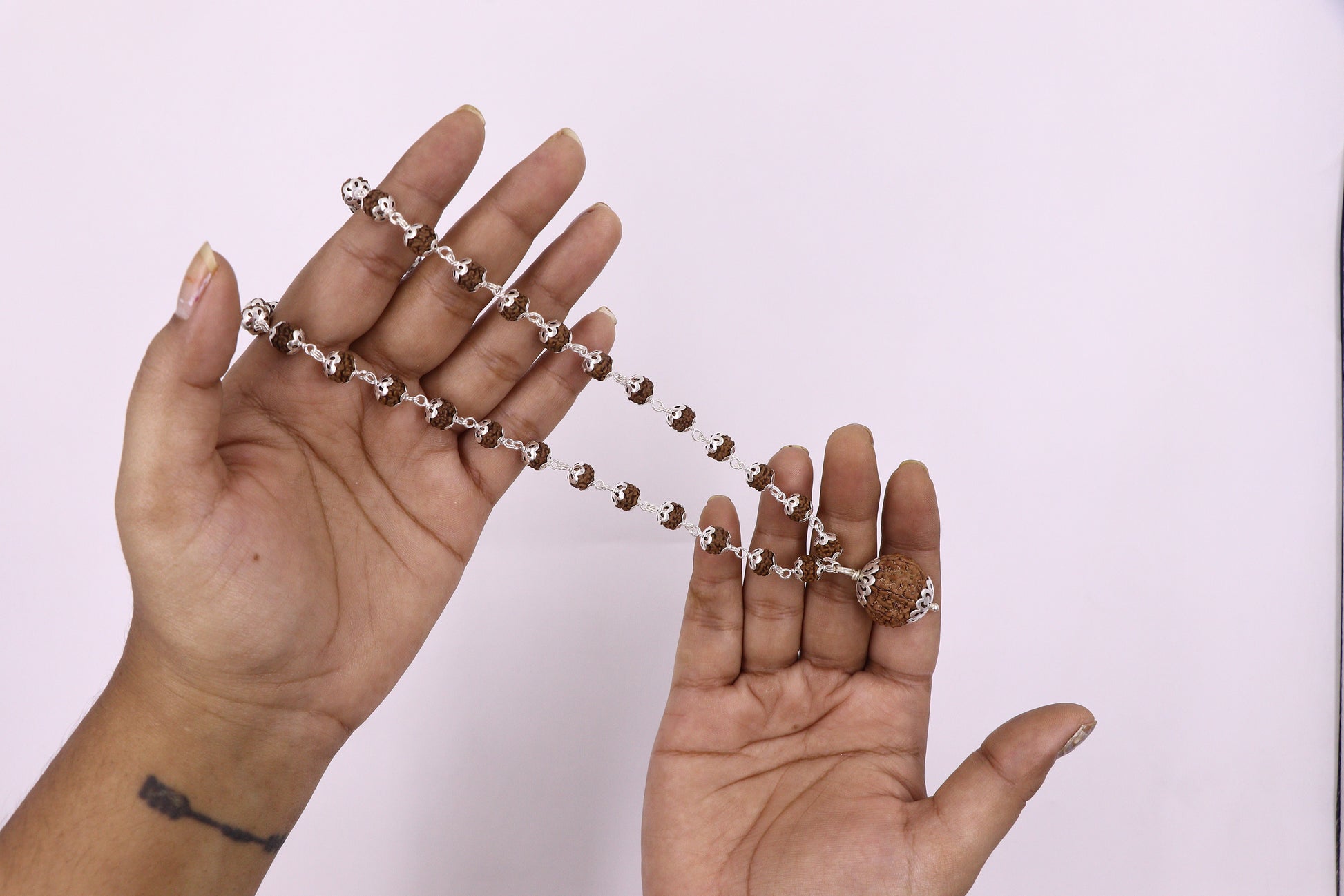 SATAT 54 bead Rudraksha mala with 7 Mukhi Nepal Rudraksha Pendant