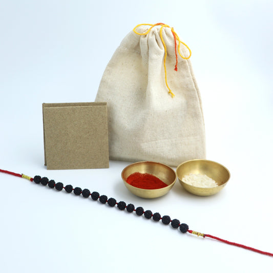 Black Rudraksha Rakhi With Rori & Chawal Tika