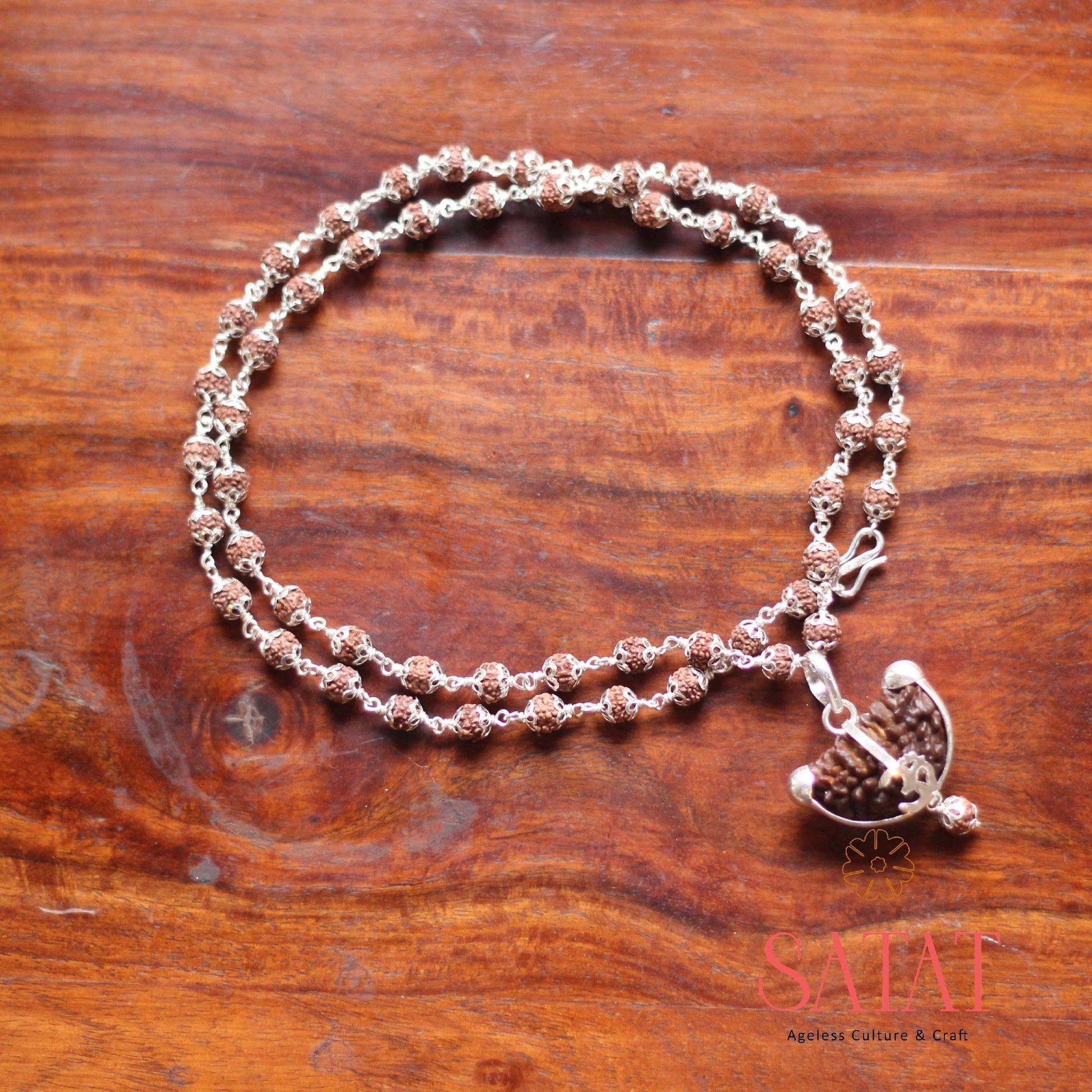 Silver Cap Rudraksha Mala with ek Mukhi Locket